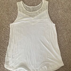 White tank top with lace on top.